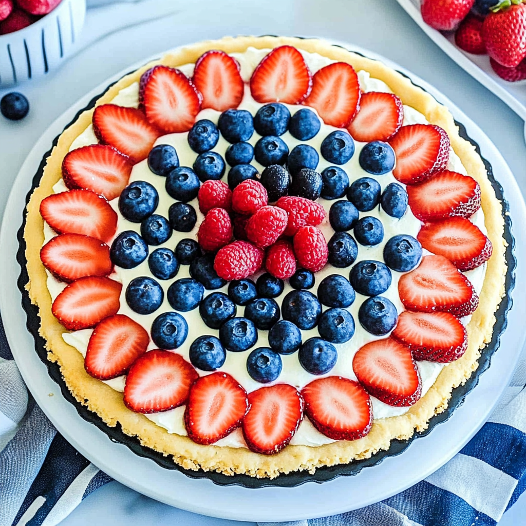 Recipe preparation for Red, White, and Blue Fruit Pizza